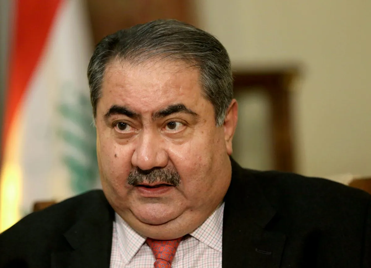 Iraq's Finance Minister Hoshyar Zebari speaks during an interview with the Associated Press in Baghdad, Iraq, on Wednesday, Dec 3, 2014. Iraq's finance minister says plunging oil prices and soaring costs from the country's war against the Islamic State group is hurting the country's economy. (AP Photo/Hadi Mizban)