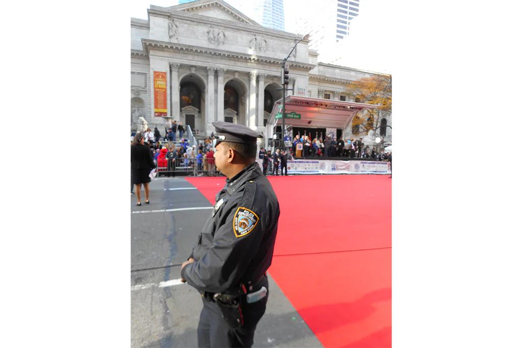 NYPD officer on post at Fifth Avenue and 41st Street during the Veterans Day Parade on Nov. 11, 2014. (Vincent J. Bove)