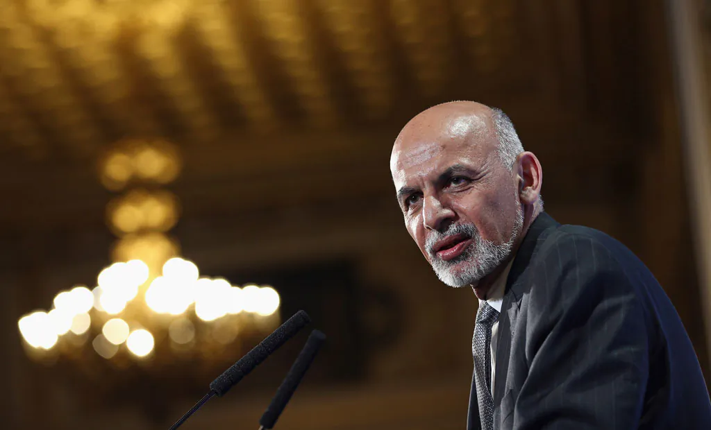Afghanistan's President Ashraf Ghani speaks to delegates and ministers during the London Conference on Afghanistan on Thursday, Dec. 4, 2014, in London, England. The United States, Britain and other allies promised Thursday not to abandon Afghanistan's new government, responding to pleas by Kabul for continued support as international security missions wind down and Taliban attacks surge. (AP Photo/Dan Kitwood)