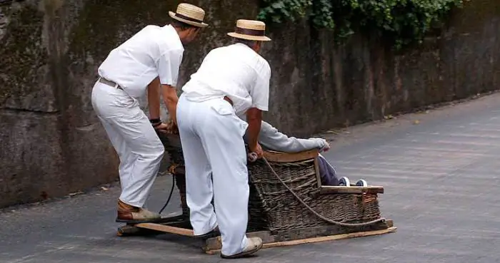 Toboggan riding in Madeira, Portugal. (madeira-web.com)