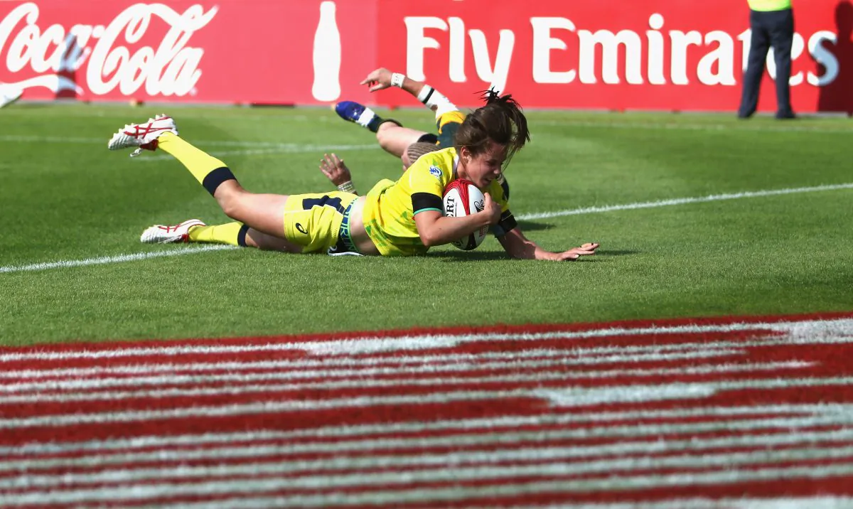 Chloe Dalton of Australia scores a try against South Africa during the IRB Women's Sevens Rugby World Series at the Emirates Dubai Rugby Sevens on December 4, 2014 in Dubai, United Arab Emirates. (Warren Little/Getty Images)