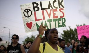 Police Investigating Couple Seen Covering Up 'Black Lives Matter' Mural