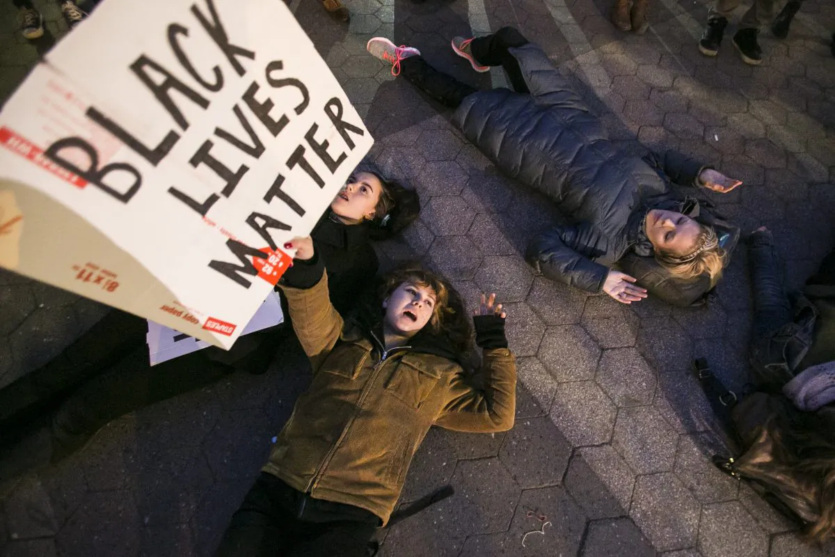 Protesters in Union Square on Dec. 4, 2014, a day after the Staten Island grand jury decision not to indict a white police officer for placing an unarmed black man, Eric Garner, in a chokehold. (Samira Bouaou/ Epoch Times)