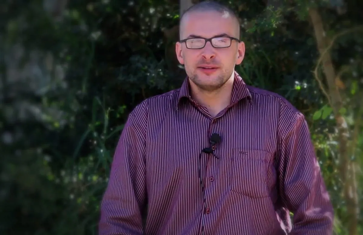 This image made from video posted online by militants on Thursday, Dec. 4, 2014, which has been verified and is consistent with other AP reporting, shows Luke Somers, an American photojournalist born in Britain and held hostage and killed by al-Qaida's affiliate in Yemen. (AP Photo/Militant Video)