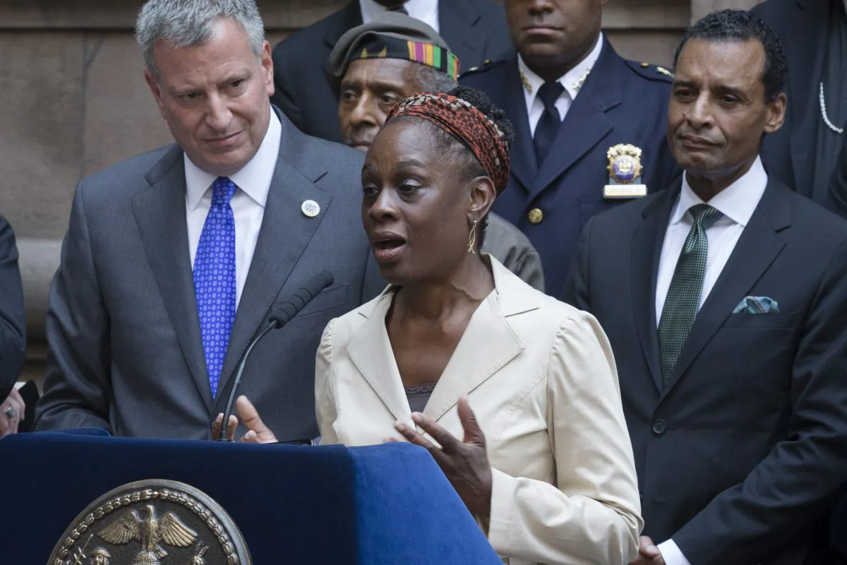 First Lady Chirlane McCray during a news conference alongside her husband New York City Mayor Bill de Blasio (L) in New York on Aug. 20. McCray will accompany Britain’s Kate, the Duchess of Cambridge, on her first visit to New York when she tours a children's development center in Harlem. (AP Photo/John Minchillo)