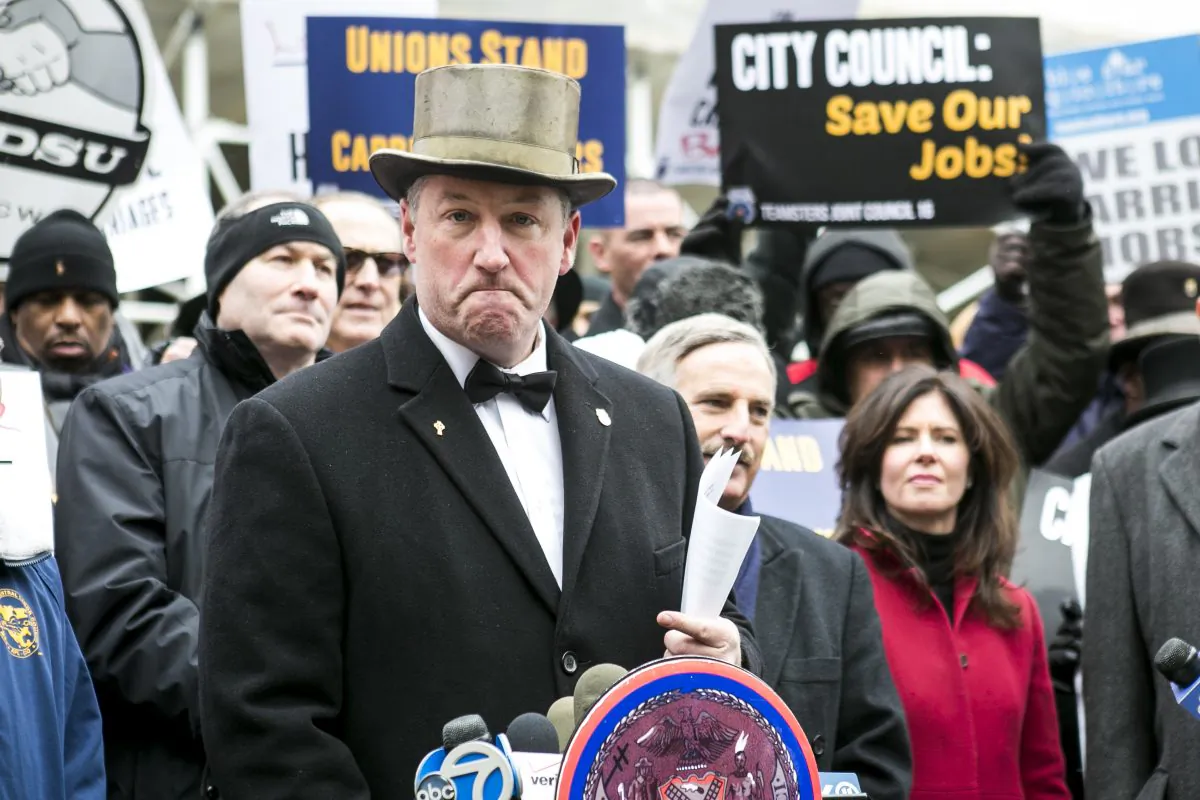 Stephen Malone, horse owner and carriage driver, opposed the proposed horse-drawn carriage ban at City Hall in New York, Dec. 8, 2014. (Samira Bouaou/Epoch Times)