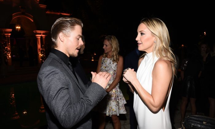Dancer Derek Hough and host committee member Kate Hudson attend Goldie Hawn's inaugural 'Love In For Kids' benefiting the Hawn Foundation's MindUp program transforming children's lives for greater success at Ron Burkle's Green Acres Estate on November 21, 2014 in Beverly Hills, California. (Photo by Michael Buckner/Getty Images for The Hawn Foundation)