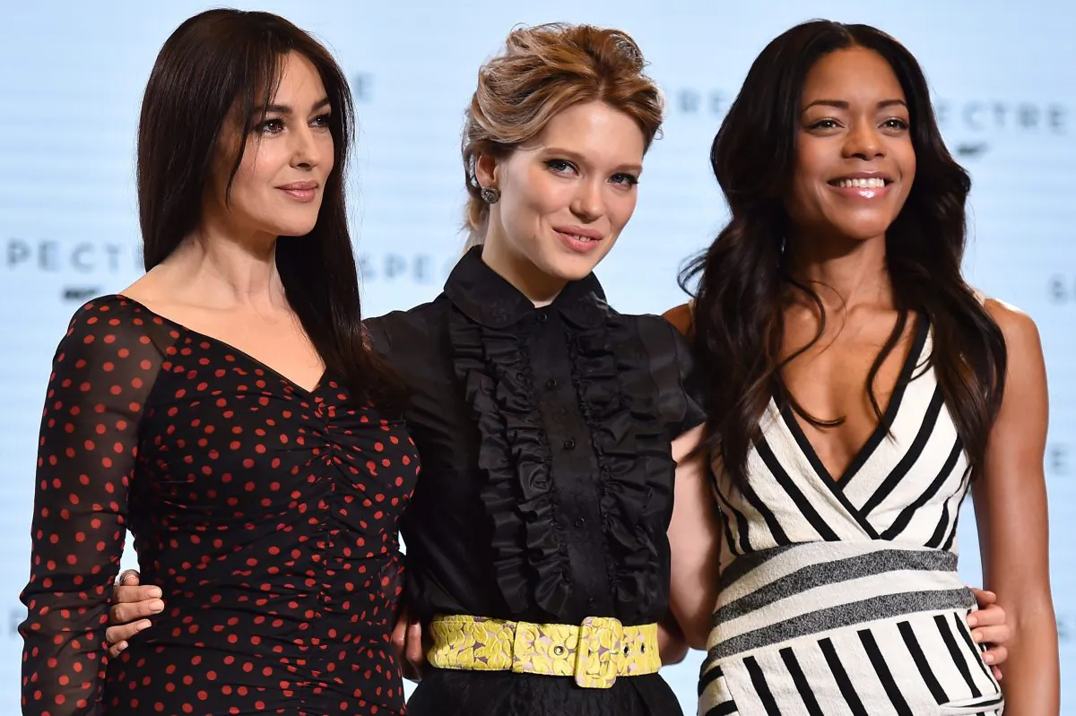 Italian actress Monica Bellucci (L), French actress Lea Seydoux (C) and British actress Naomi Harris (R) pose during an event to launch the 24th James Bond film 'Spectre' at Pinewood Studios at Iver Heath in Buckinghamshire, west of London, on December 4, 2014. French actress Lea Seydoux and Italian star Monica Bellucci will star alongside Britain's Daniel Craig in the new James Bond film 'Spectre', the producers said on December 4 at the historic Pinewood Studios. (Ben Stansall/AFP/Getty Images)