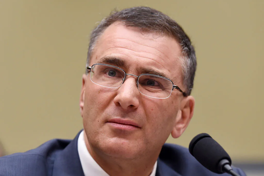 MIT economist Jonathan Gruber listens as he testifies on Capitol Hill in Washington, Tuesday, Dec. 9, 2014, before the House Oversight Committee health care hearing. Congressional Democrats charged Tuesday that Republicans are seizing on a health adviser's self-described "thoughtless" and misleading remarks to attack President Barack Obama's signature health care law. (AP Photo/Molly Riley)