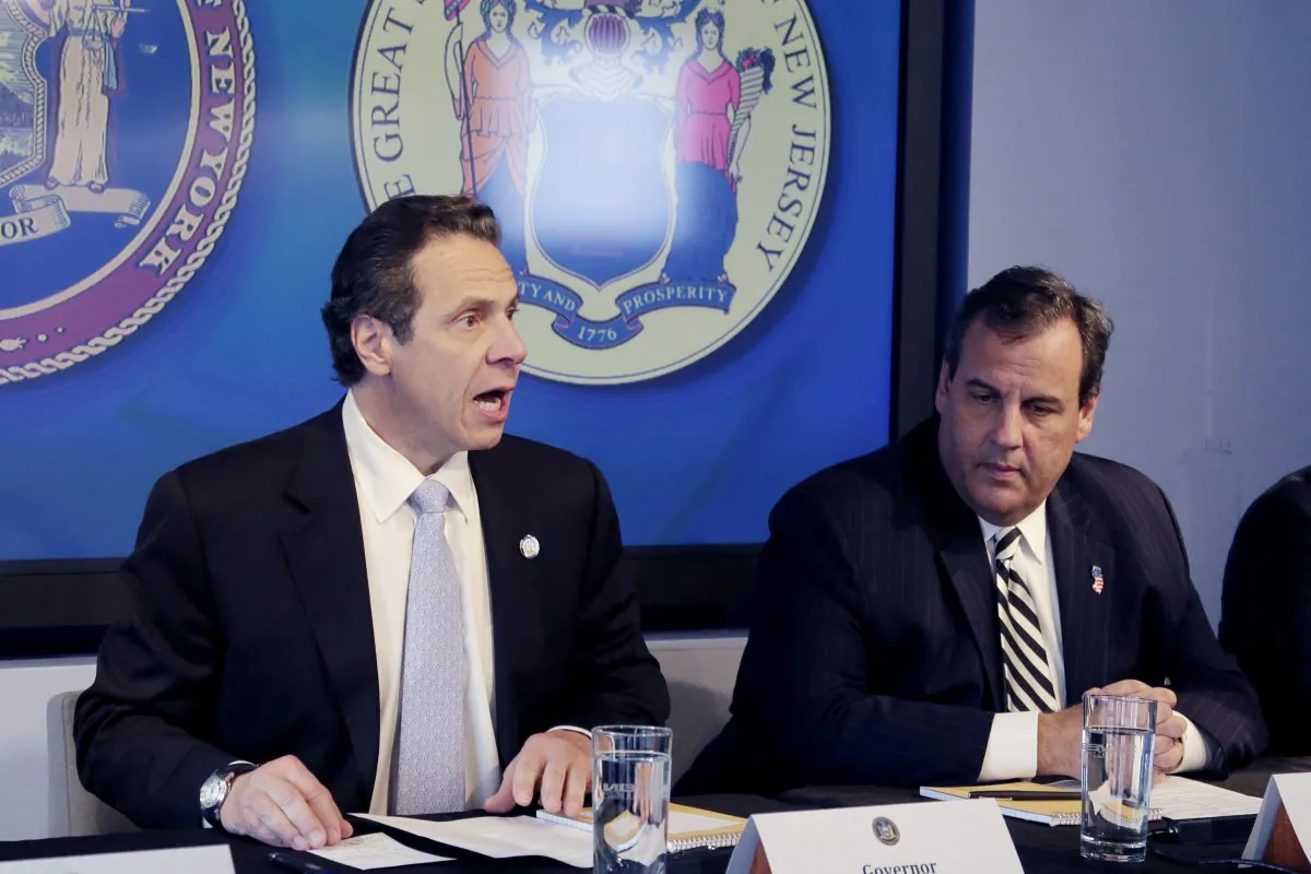 New York Governor Andrew Cuomo (L) and New Jersey Governor Chris Christie at a news conference in New York on Oct. 24, 2014. Legislation to overhaul how the Port Authority of New York and New Jersey is governed remains unsigned by both states' governors. (AP Photo/Mark Lennihan)
