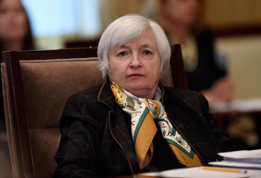 Federal Reserve Chair Janet Yellen attends the Board of Governors of the Federal Reserve System open meeting at the Federal Reserve Building in Washington, Tuesday, Dec. 9, 2014, to discuss a proposal to establish risk-based capital surcharges for systemically important bank holding companies. (AP Photo/Susan Walsh)