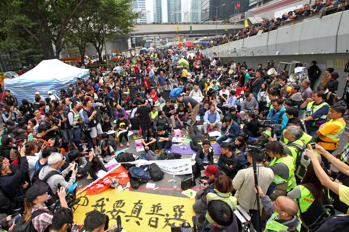 Pro-democracy protesters, pan-democrat lawmakers hold a sit-in at the Admiralty protest site on Dec. 11, 2014, Hong Kong. (Poon Zai Shu/Epoch Times)