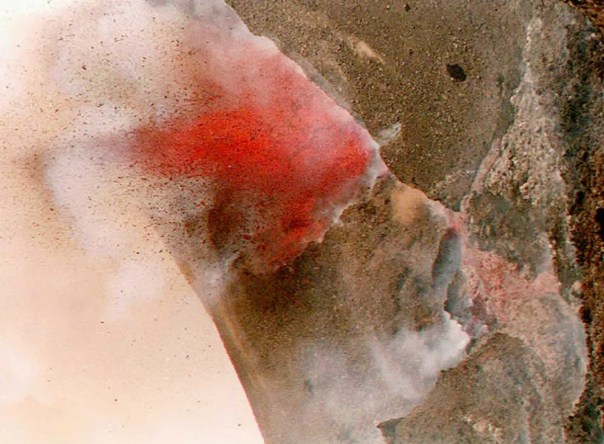 Red lava streams on April 14, 1994, from the crater of the Fogo Island volcano, which erupted April 1. Hundreds of local residents have been evacuated as the lava advances, destroying the settlements at the foot of the volcano of the Cape Verdian island, off the coast of Senegal. (Vargos Borga/AFP/Getty Images)