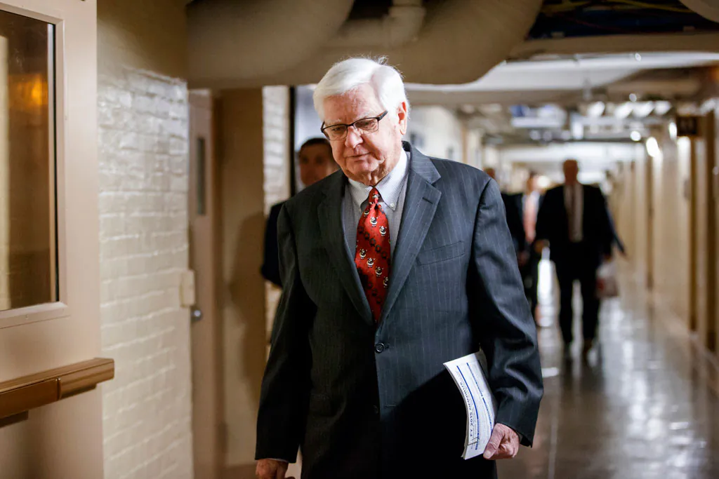 House Appropriations Committee Chairman Rep. Hal Rogers (R-Ky.) walks through a basement corridor on Capitol Hill in Washington, Wednesday, Dec. 9, 2014, on the way to a House Republican Conference meeting. With time running short before Congress adjourns, Republicans and Democrats agreed Tuesday on a $1.1 trillion spending bill to avoid a government shutdown and delay a politically-charged struggle over President Barack Obama's new immigration policy until the new year. Rogers said the measure "will allow us to fulfill our constitutional duty to responsibly fund the federal government and avoid a shutdown." (AP Photo/J. Scott Applewhite)