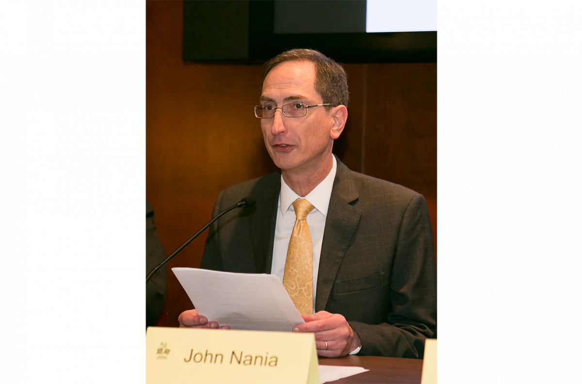 John Nania, editor-in-chief of the English-language editions of the Epoch Times, speaking at the Nine Commentaries 10th anniversary forum in the Capitol Visitor's Center in Washington, D.C., on Dec. 3, 2014. (Lisa Fan/Epoch Times)