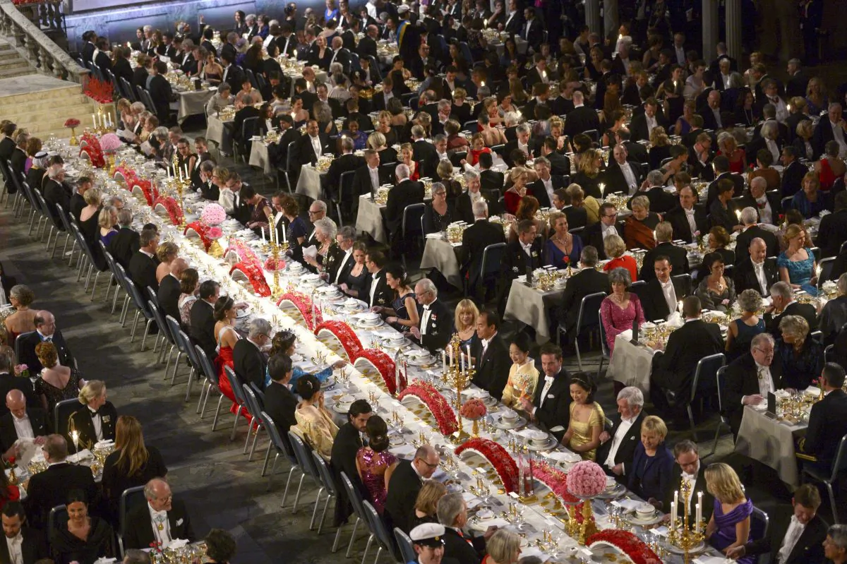 An overview of guests seated at the traditional Nobel banquet at the Stockholm City Hall, Wednesday, Dec. 10, 2014, following the Nobel Prize award ceremonies for Medicine, Physics, Chemistry, Literature and Economic Sciences. (AP Photo/TT News Agency, Fredrik Sandberg)