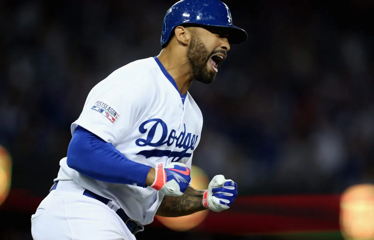 Matt Kemp #27 of the Los Angeles Dodgers celebrates hitting a solo home run to lead off in the eighth inning of Game Two of the National League Division Series against the St. Louis Cardinals at Dodger Stadium on October 4, 2014 in Los Angeles, California. (Photo by Stephen Dunn/Getty Images)