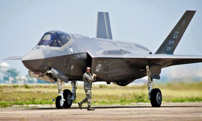 The U.S. Air Force F-35 Lightning II joint strike fighter sits at Eglin Air Force Base, Fla., July 14, 2011. An independent review of the troubled F-35 stealth fighter program warns Ottawa that there's increasingly less wiggle room in its $9 billion budget envelope if it intends to buy the F-35 stealth fighter. (The Canadian Press/AP, U.S. Air Force, Samuel King Jr.)