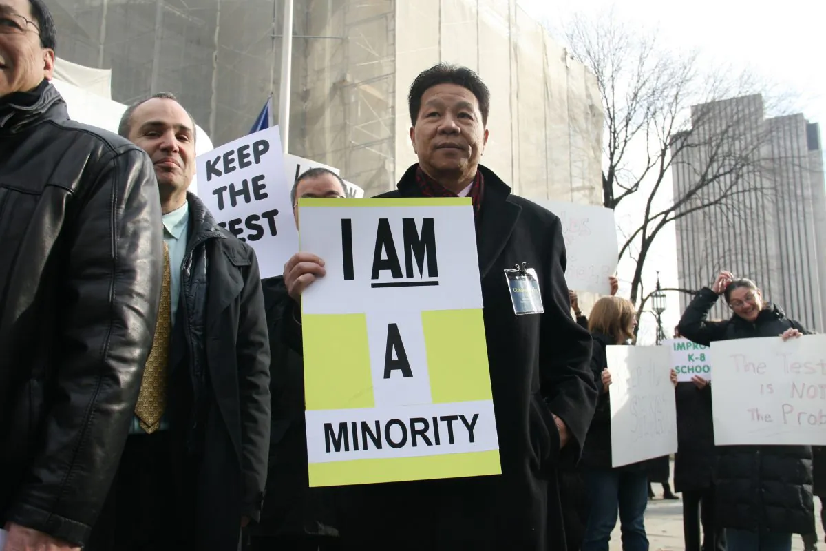 Phil Gim, 62, co-founder of a specialized high schools admissions exam advocacy group, on the steps of City Hall, Manhattan, N.Y. on Dec. 11, 2014. (Shannon Liao/Epoch Times)