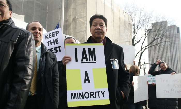 Phil Gim, 62, co-founder of a specialized high schools admissions exam advocacy group, on the steps of City Hall, Manhattan, N.Y. on Dec. 11, 2014. (Shannon Liao/Epoch Times)