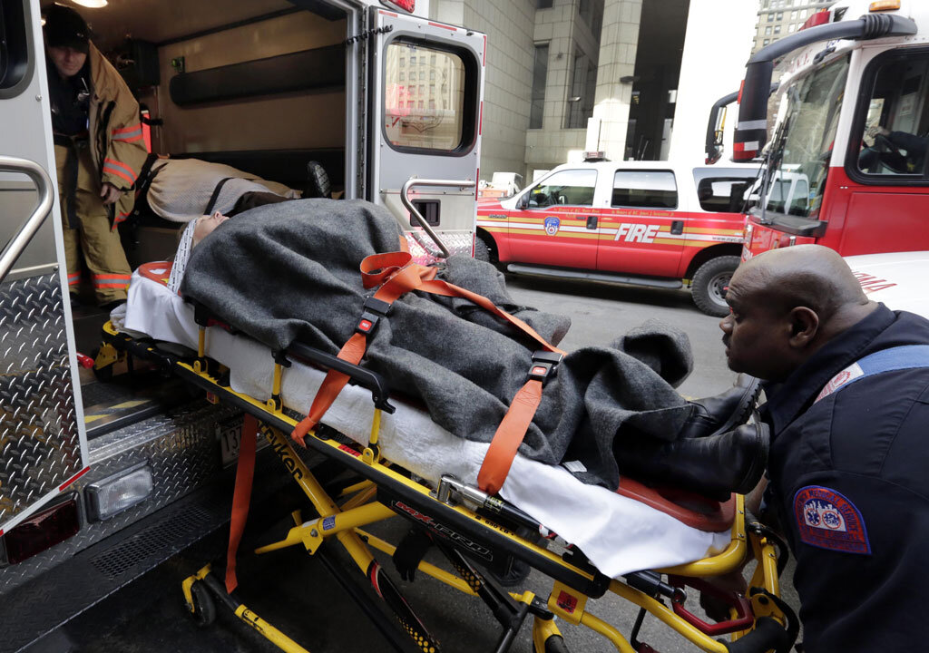 An injured passenger of a New Jersey ferry is loaded into an ambulance, in New York, on Jan. 9, 2013. Nearly 20 percent of U.S. consumers — 42.9 million people — have unpaid medical debts, according to a new report released Thursday, Dec. 11, 2014, by the Consumer Financial Protection Bureau. The findings suggest that many Americans lack the financial resources to pay for health emergencies — and that the notices from hospitals and insurance companies about the cost of treatment are confusing and baffling. (AP Photo/Richard Drew)