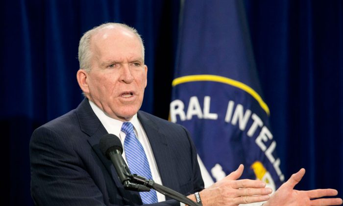 Central Intelligence Director (CIA) Director John Brennan gestures during a news conference at CIA Headquarters in Langley, Va., Thursday, Dec. 11, 2014. Brennan is pushing back hard against the wave of criticism following a Senate Intelligence Committee report detailing harsh interrogation tactics employed by intelligence community people against terrorism war-era detainees. Brennan and several past CIA leaders fear the historical record may define them as torturers instead of patriots. The CIA is now in the uncomfortable position of defending itself publicly, given its basic mission to protect the country secretly. (AP Photo/Pablo Martinez Monsivais)