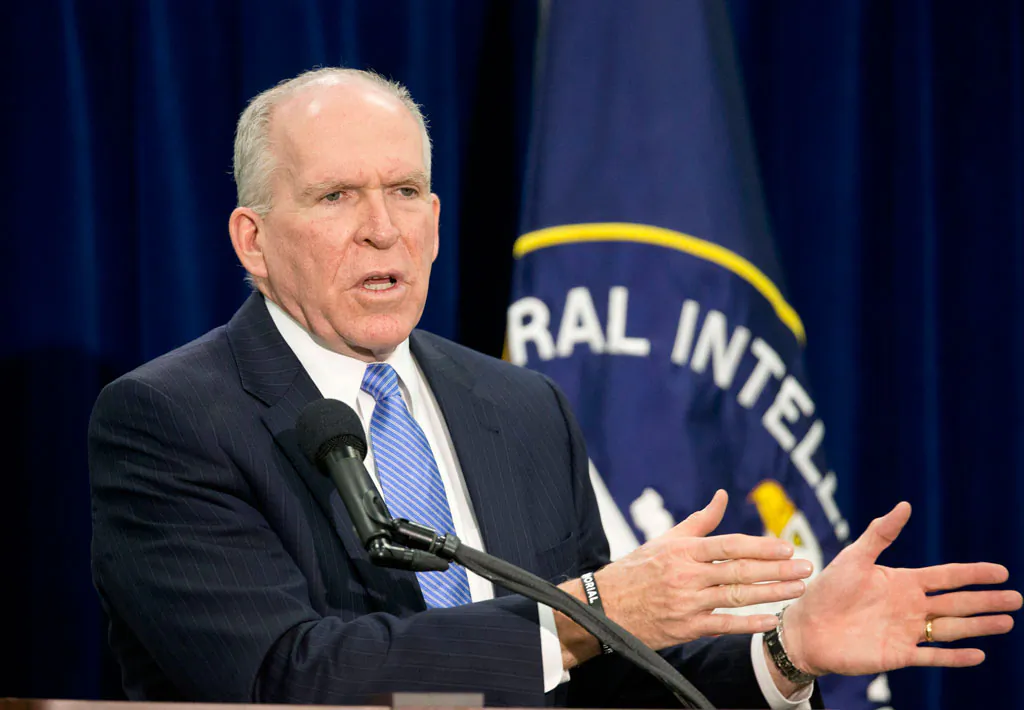 Central Intelligence Director (CIA) Director John Brennan gestures during a news conference at CIA Headquarters in Langley, Va., Thursday, Dec. 11, 2014. Brennan is pushing back hard against the wave of criticism following a Senate Intelligence Committee report detailing harsh interrogation tactics employed by intelligence community people against terrorism war-era detainees. Brennan and several past CIA leaders fear the historical record may define them as torturers instead of patriots. The CIA is now in the uncomfortable position of defending itself publicly, given its basic mission to protect the country secretly. (AP Photo/Pablo Martinez Monsivais)