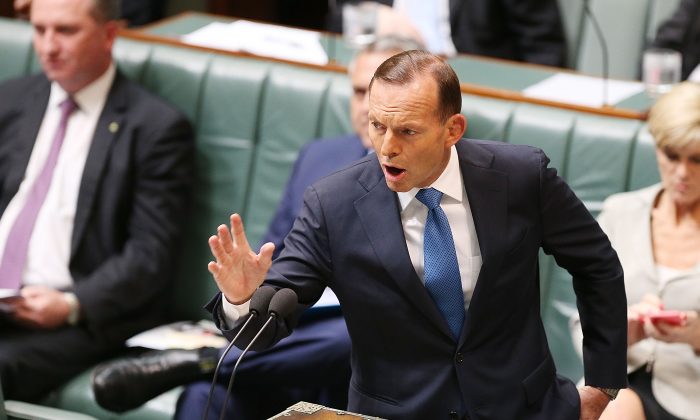 Prime Minister Tony Abbott during House of Representatives question time at Parliament House, on Dec. 4 in Canberra, on the official last day of sitting at Parliament for 2014. Parliament will return on Feb. 9, 2015. (Stefan Postles/Getty Images) 