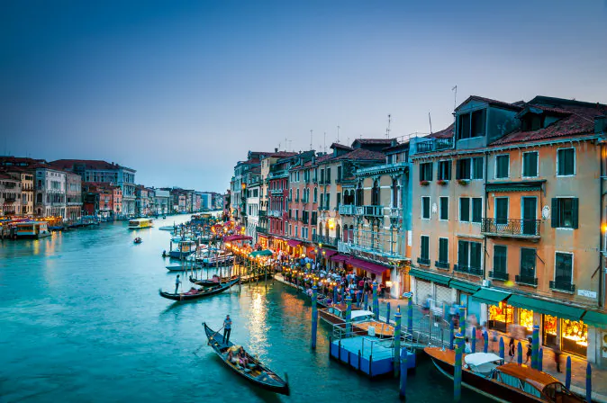 Colorful view of Grand canal in Venice at the twilight via Shutterstock*