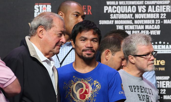 Top Rank Founder and CEO Bob Arum, Manny Pacquiao and trainer Freddie Roach talk during the official weigh in at The Venetian on November 22, 2014 in Macau. Pacquiao will defend his WBO world welterweight title against Chris Algieri in Macau. (Photo by Chris Hyde/Getty Images)