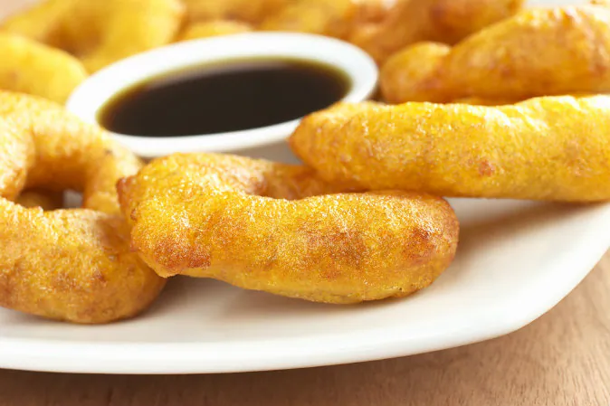 Peruvian dessert called "picarones" via Shutterstock*
