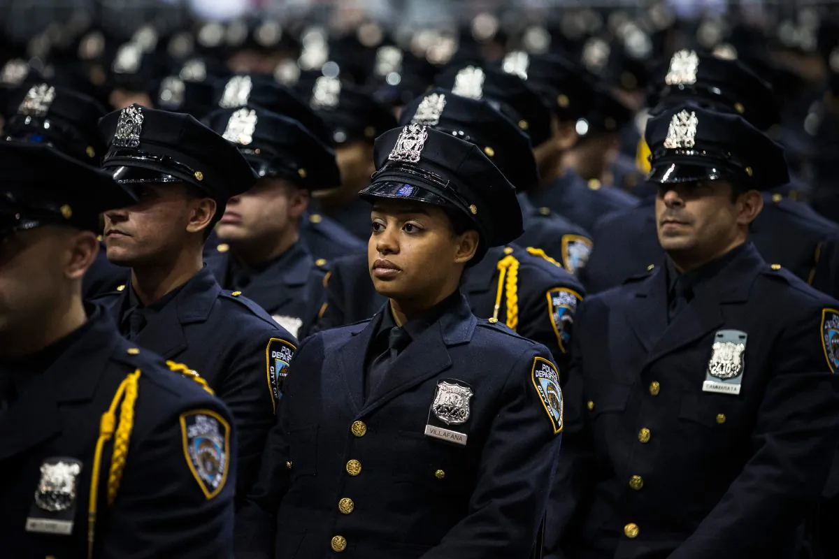 New York City Police Academy cadets attend their graduation ceremony at the Barclays Center in Brooklyn, New York, on July 2, 2013. (Andrew Burton/Getty Images)