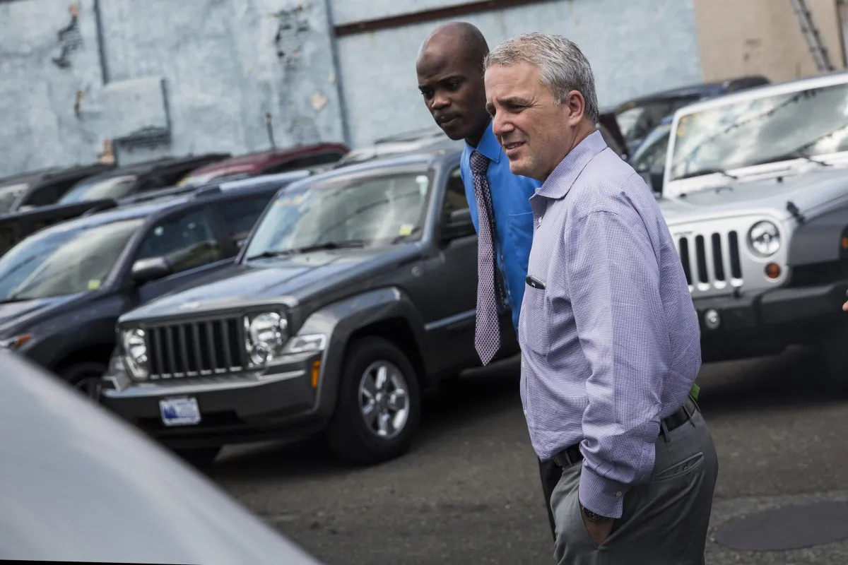 A customer shops at a Jeep dealership on Aug. 6 in New York City. (Andrew Burton/Getty Images)