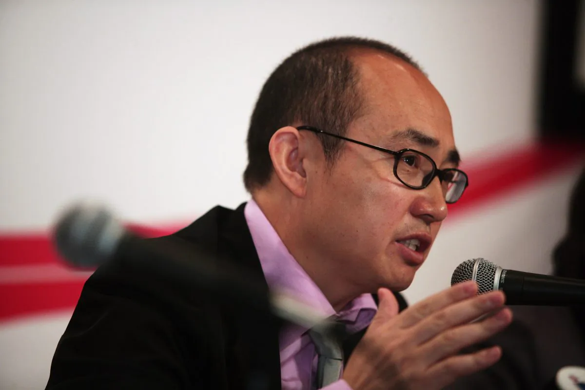 Pan Shiyi, chairman of SOHO China, delivers SOHO China’s financial results on March 13, 2009, in Hong Kong. Pan called for an end to China’s Internet blockade at a recent conference in Beijing. (Lo Ka Fai/China Photos/Getty Images)