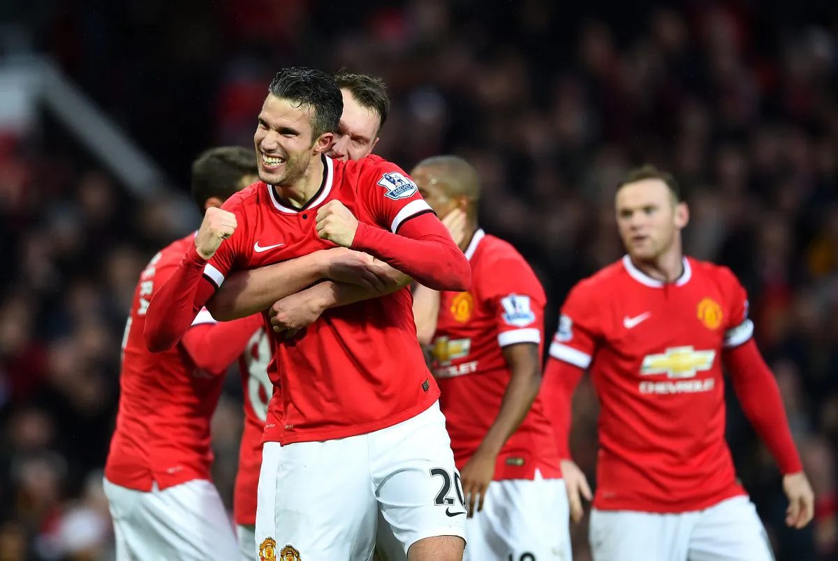 Robin van Persie of Manchester United celebrates scoring the third goal during the Barclays Premier League match between Manchester United and Liverpool at Old Trafford in Manchester, England. (Shaun Botterill/Getty Images) 