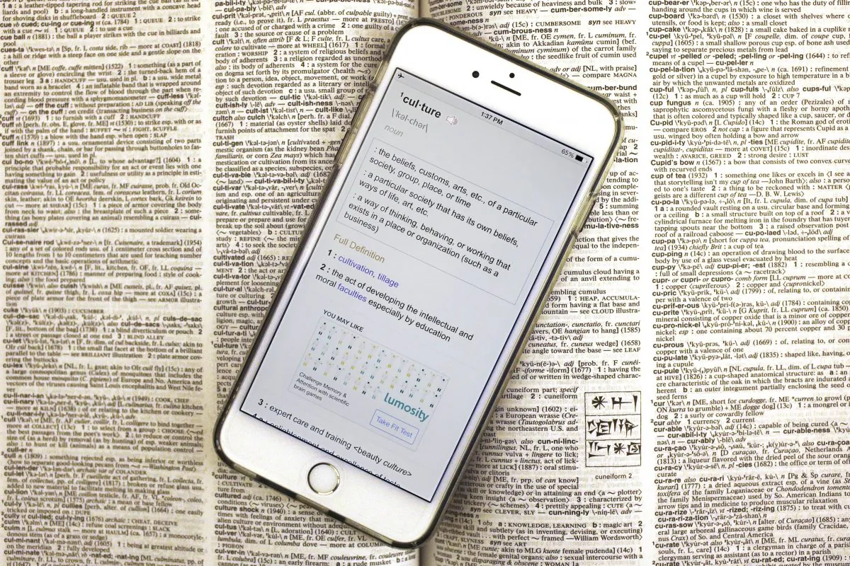Merriam-Webster's 2014 word of the year, "culture," on the Merriam-Webster smartphone app. It's been looked up an estimated 100 million times this year. (AP Photo/Stephan Savoia)