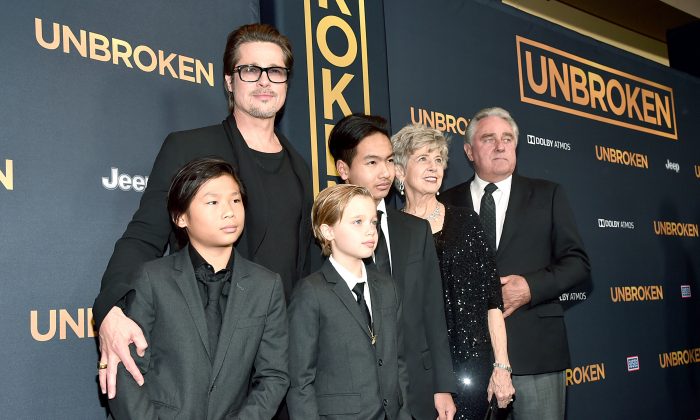 Actor Brad Pitt (C), (L-R) Pax Thien Jolie-Pitt, Shiloh Nouvel Jolie-Pitt,, Maddox Jolie-Pitt, Jane Pitt, and William Pitt attend the premiere of Universal Studios' "Unbroken" at TCL Chinese Theatre on December 15, 2014 in Hollywood, California. Pitt reportedly was reunited with children last week. (Alberto E. Rodriguez/Getty Images)