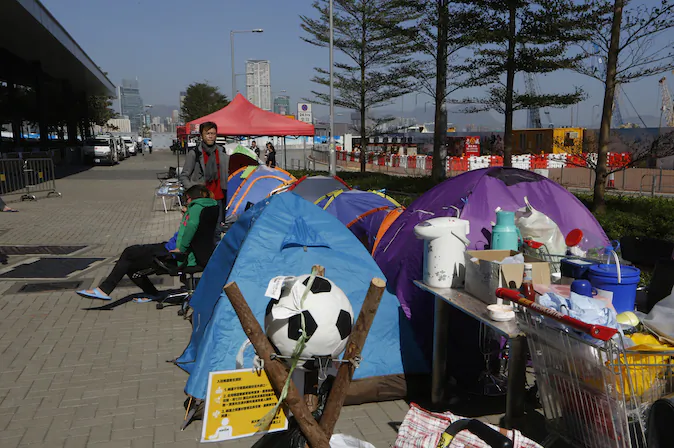 Wait, didn't the Hong Kong government and every one else declared the pro-democracy occupation over? (AP Photo/Kin Cheung)
