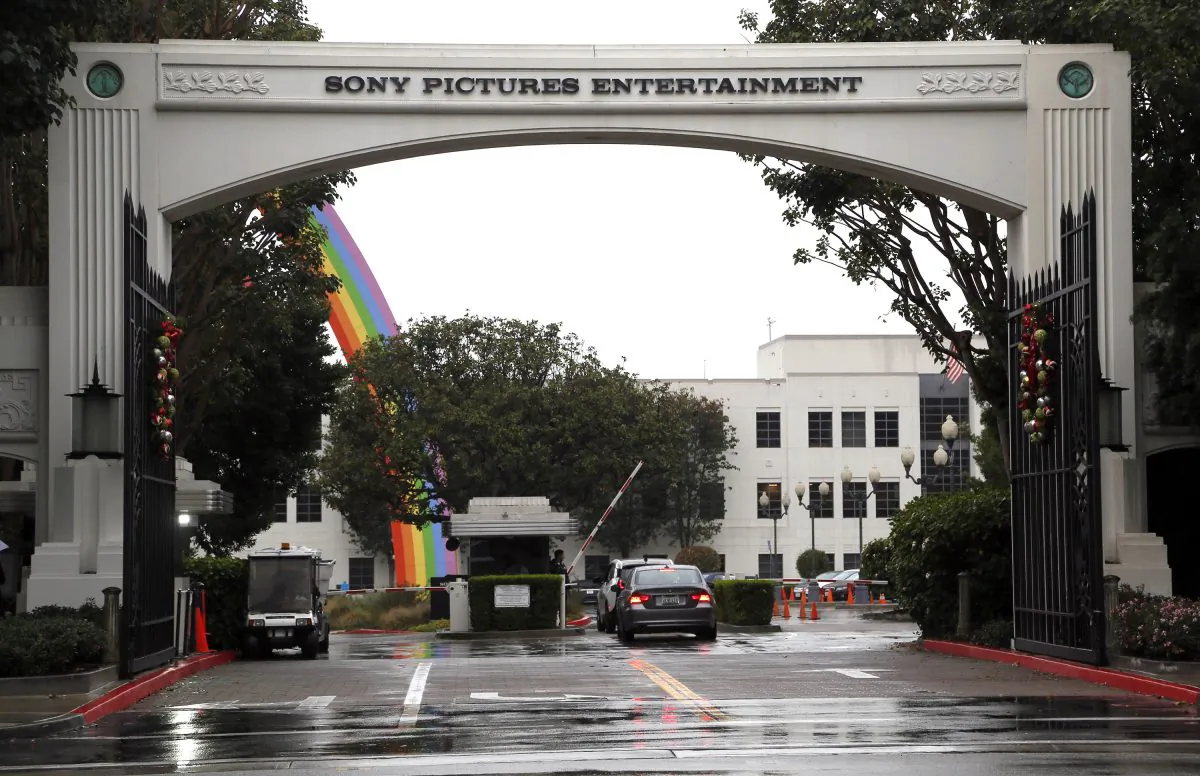 Cars enter Sony Pictures Entertainment headquarters in Culver City, Calif., on Dec. 2, 2014. Hackers calling themselves Guardians of Peace on Tuesday, Dec. 16, 2014 released another round of data leaks, including ominous threats against the premiere of Sony Pictures' film "The Interview," in which the group references the terrorist attacks of Sept. 11, 2001. (AP Photo/Nick Ut)