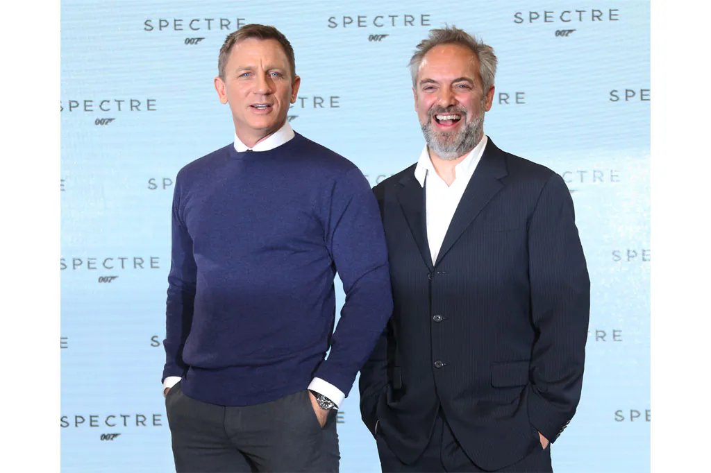 Actor Daniel Craig (L) and director Sam Mendes at the announcement for the new Bond film, the 24th in the series, at Pinewood Studios in west London on Dec. 4. (Joel Ryan/Invision/AP)