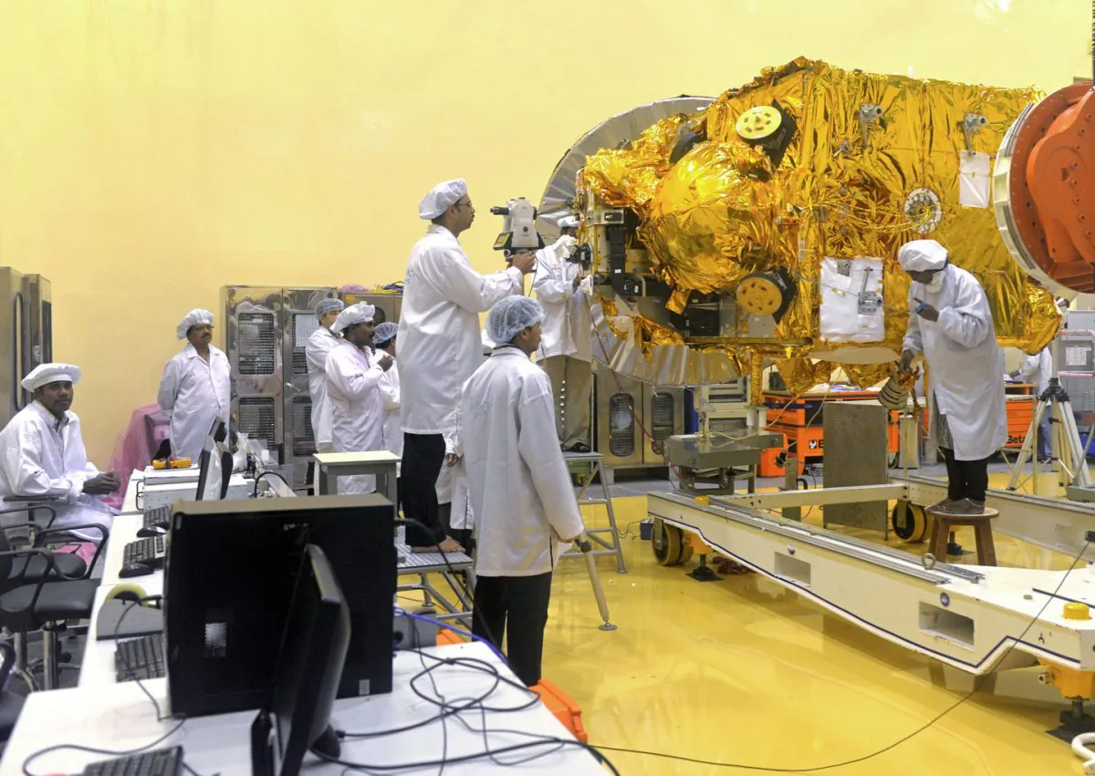 Scientists and engineers work on a Mars Orbiter vehicle at the Indian Space Research Organization’s (ISRO) satellite center in Bangalore on Sept. 11, 2013. India is slowly increasing its technology in space, both for the civilian purposes and increasingly for military purposes. (Manjunath Kiran/AFP/Getty Images)