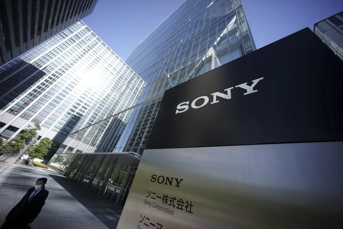 A man walks at the headquarters of Sony Corp. in Tokyo, Dec. 18. Sony's share prices jumped 5 percent on Wednesday after it canceled the release of “The Interview,” which is believed to have provoked the recent hacking. (AP Photo/Eugene Hoshiko)