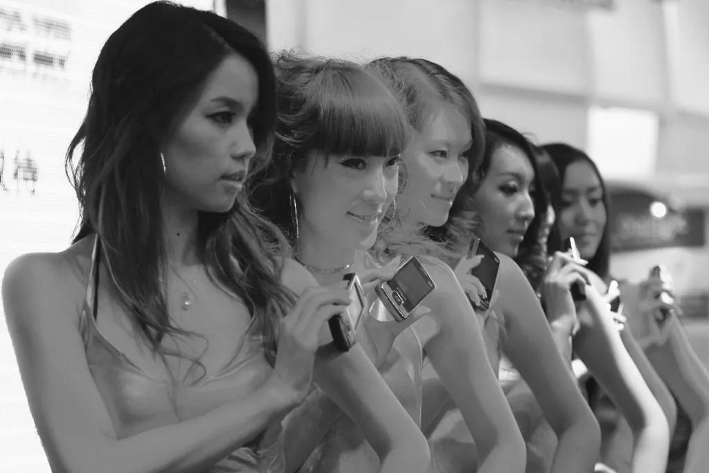 Chinese models show the new types of Coolpad mobile phones at the P&T/Expo Communication China 2008 at China International Exhibition Center on Oct. 21, 2008 in Beijing, China. Backdoors were recently discovered in Coolpad smartphones. (Feng Li/Getty Images)