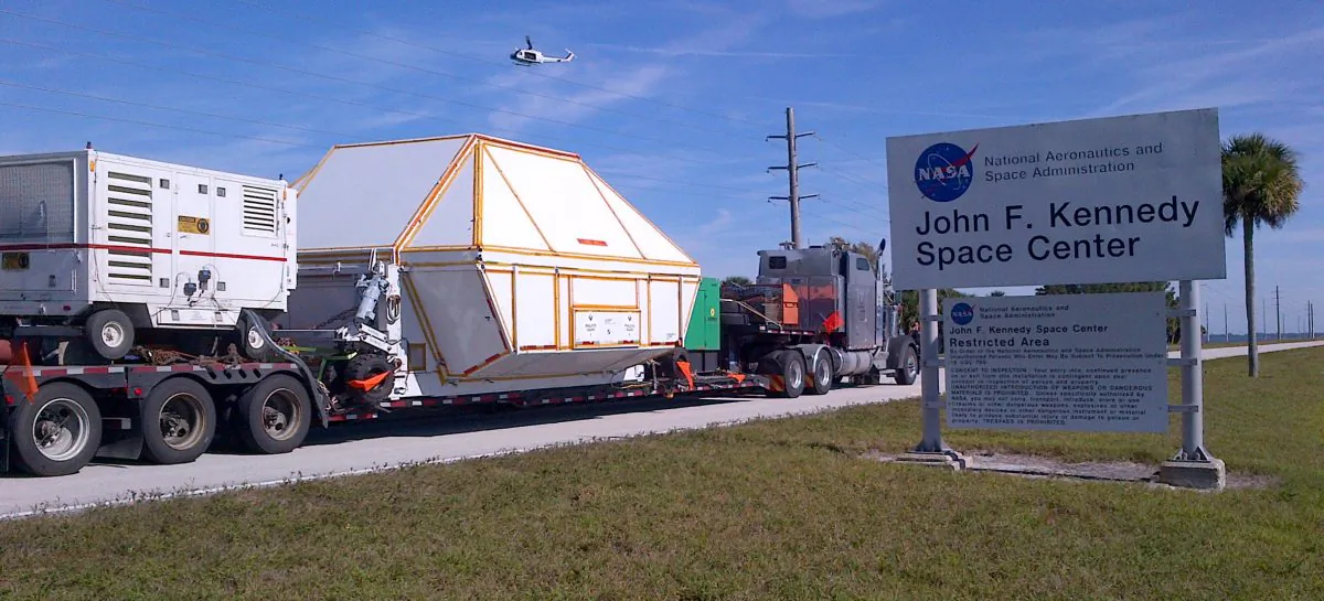 The Orion spacecraft, in a protective covering, is returned to the agencys Kennedy Space Center in Cape Canaveral, Fla., on Dec. 18, 2014. It rocketed into orbit Dec. 5, traveling 3,600 miles into space on an unmanned test flight that proved to be a great success. NASA plans to use future models to help get astronauts to Mars in coming decades. (AP Photo/NASA)