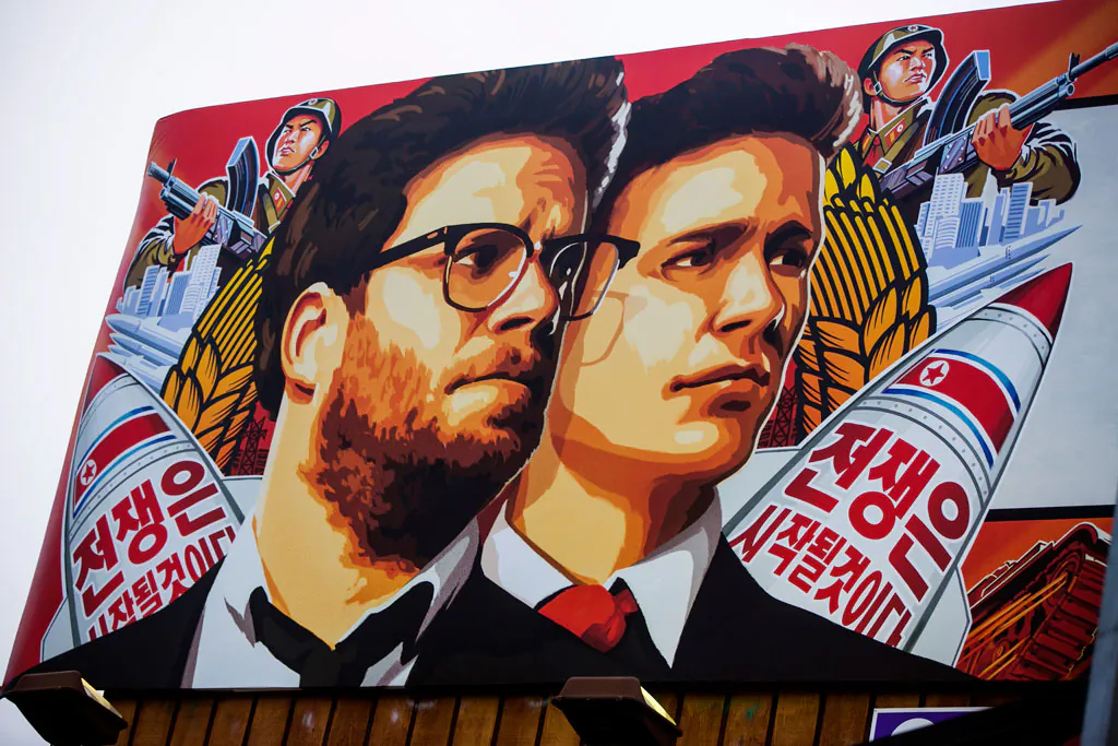 A banner for "The Interview" is posted outside Arclight Cinemas, Wednesday, Dec. 17, 2014, in the Hollywood section of Los Angeles. (AP Photo/Damian Dovarganes)