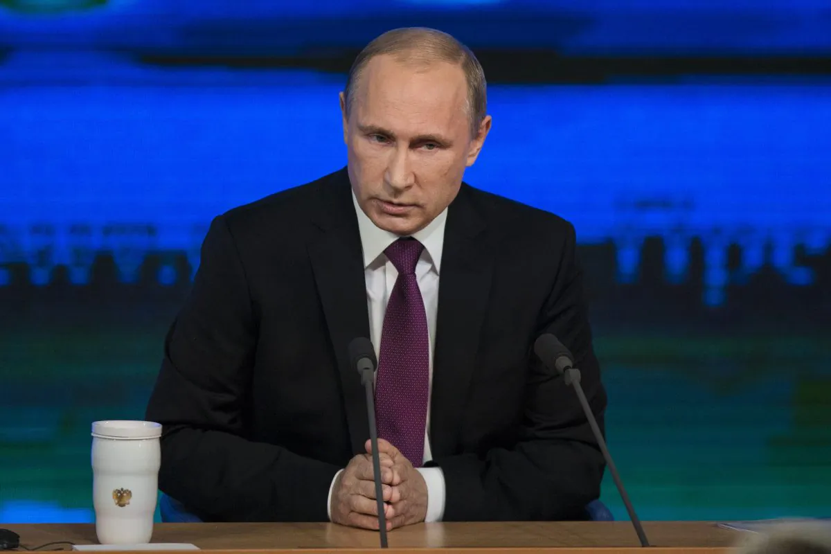 Russian President Vladimir Putin speaks during his annual news conference in Moscow, Russia, Thursday, Dec. 18, 2014. Putin says Russia has sufficient currency reserves and the ruble will recover. (AP Photo/Pavel Golovkin)