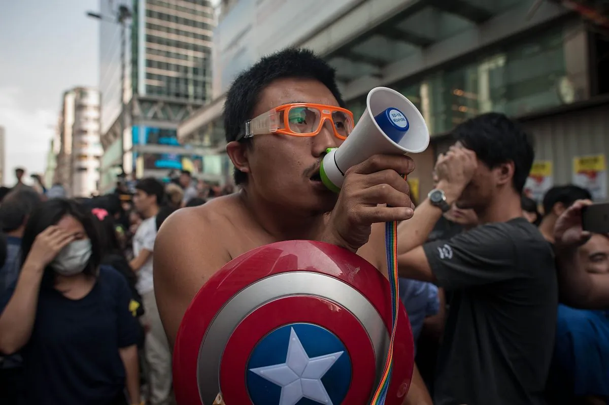Eric the Artist channeling Hong Kong "Captain America's" spirit in Mong Kok. (Anthony Kwan/Getty Images)