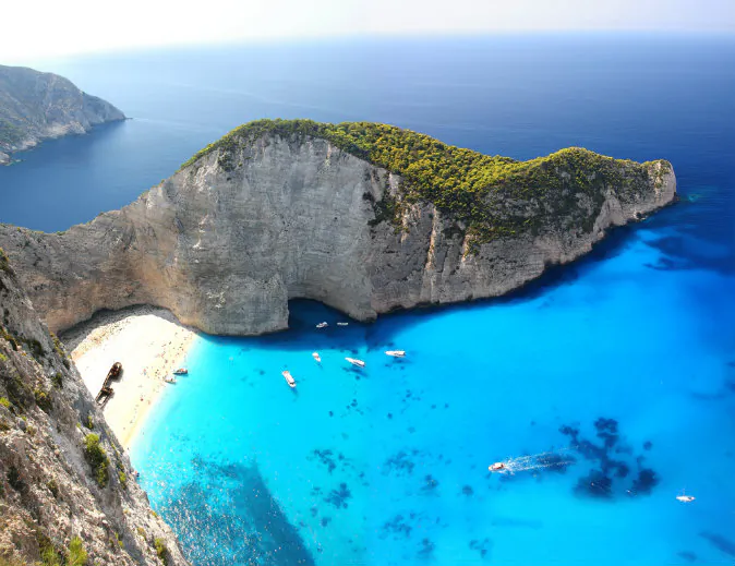 Navagio in Zakynthos, Greece via Shutterstock*