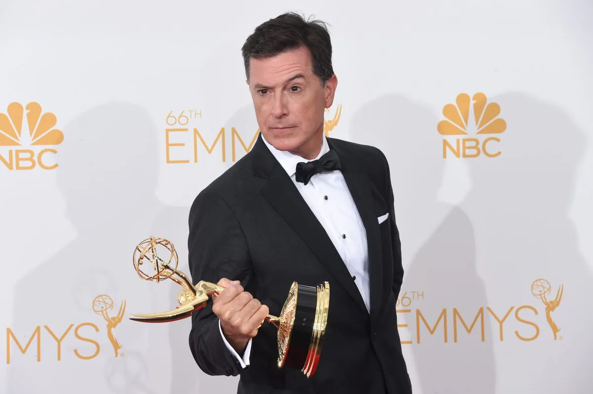 Writer/Producer/Host Stephen Colbert, winner of the for Outstanding Variety Series Award for The Colbert Report, poses in the press room during the 66th Annual Primetime Emmy Awards held at Nokia Theatre L.A. Live on Aug. 25, 2014, in Los Angeles, California. (Jason Merritt/Getty Images)