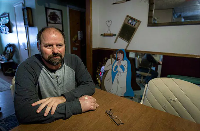 Northwest Financial Services first sued Keith and Katie Herie when they couldn't afford the $14,000 bill for Katie's emergency appendectomy. Since 2006, the Heries have had almost $20,000 taken from their wages to repay medical bills, and still owe at least $26,000, with interest mounting. (Steve Herbert for ProPublica)